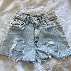 Levi’s high waisted distressed denim cutoffs
